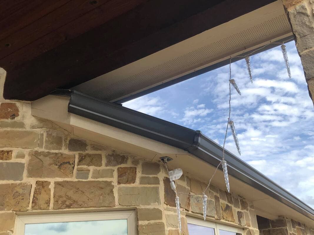 Aerial view of a finished roofing project